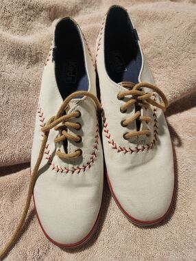 Keds White Canvas Sneakers with Red Stitching and Brown Laces